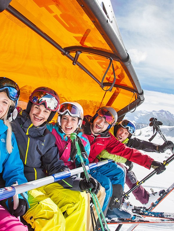 Skiers on the chair lift